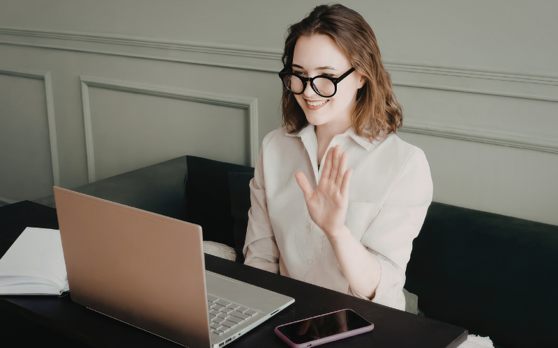 Woman Waving on Video Call